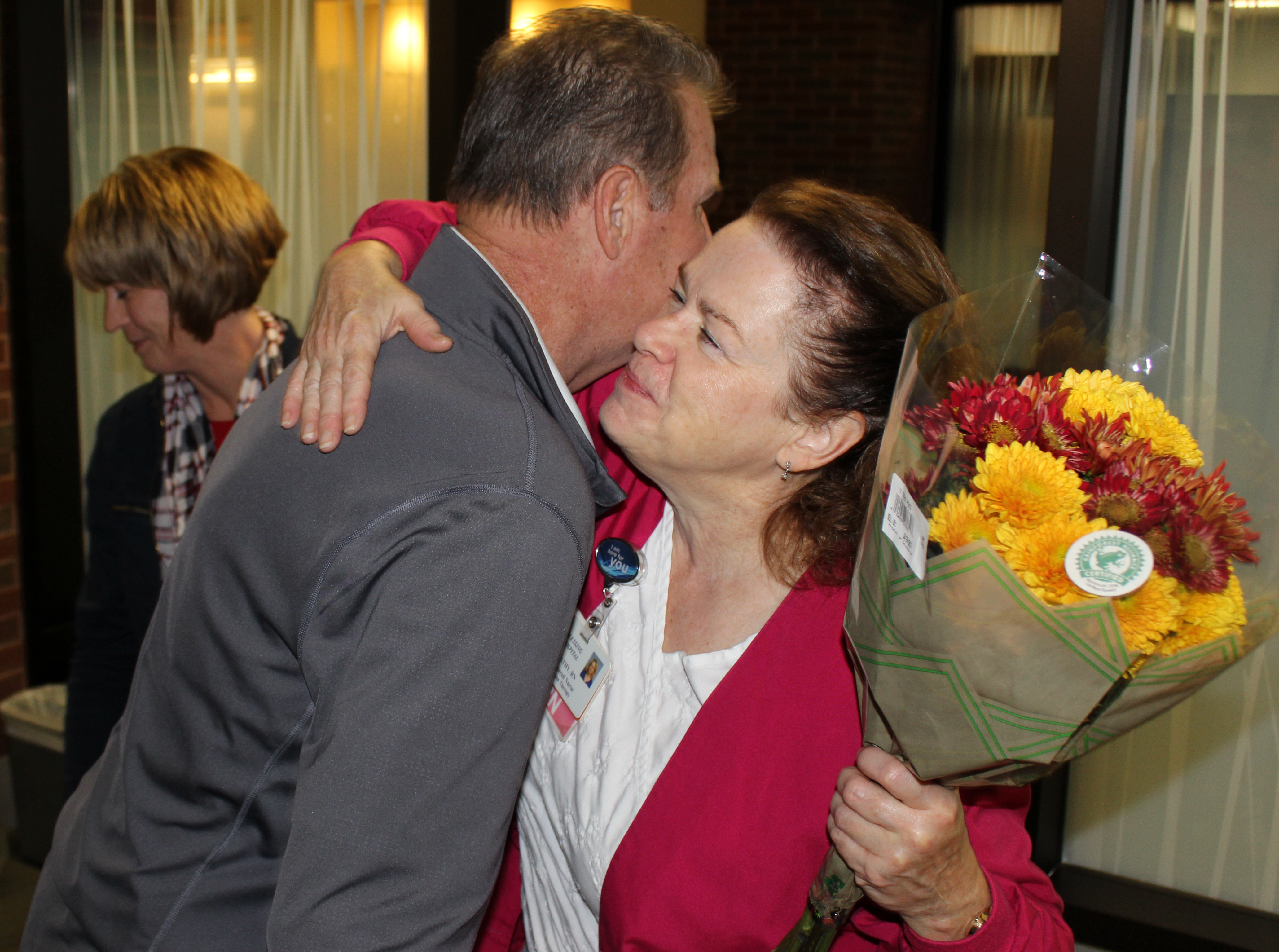 Kathy Rossmiller Hugs Patient