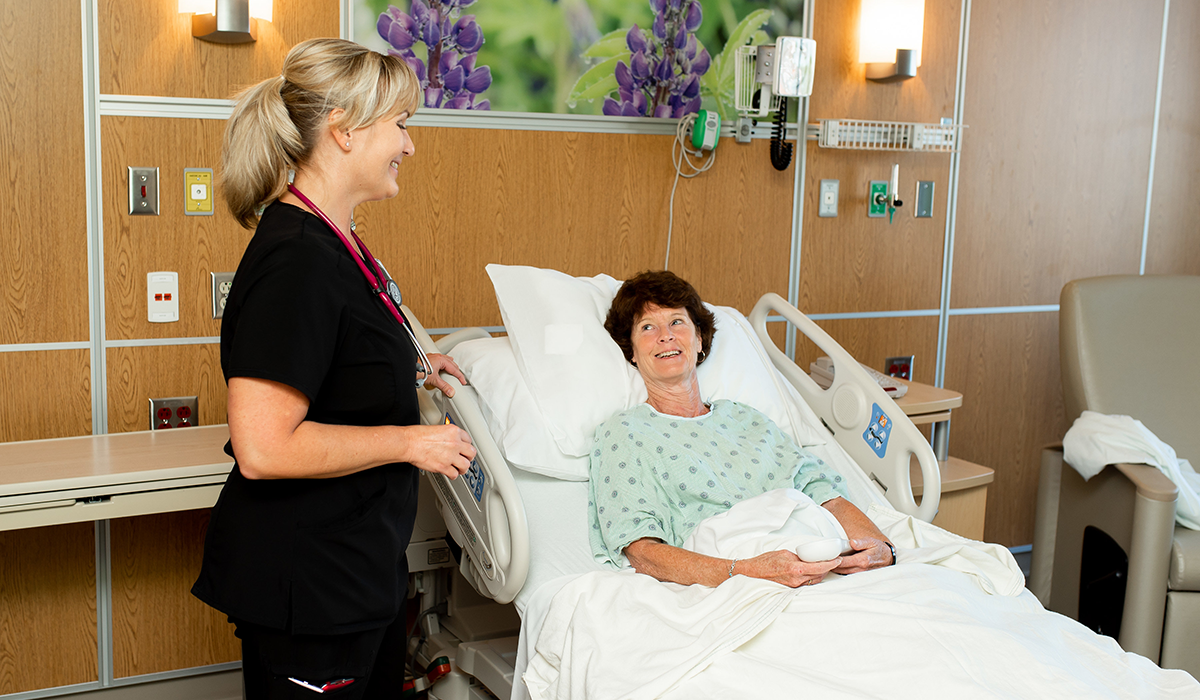 Nurse at patient bedside