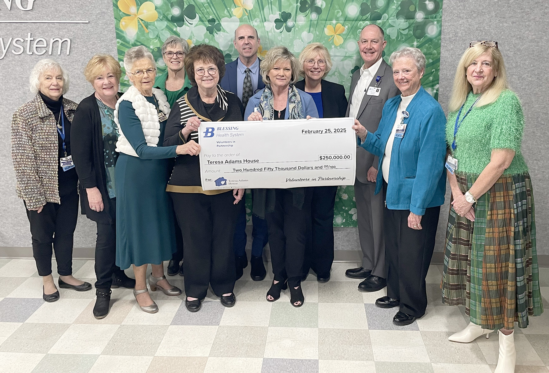 Blessing Volunteers in Sponsorship Teresa Adams House Check