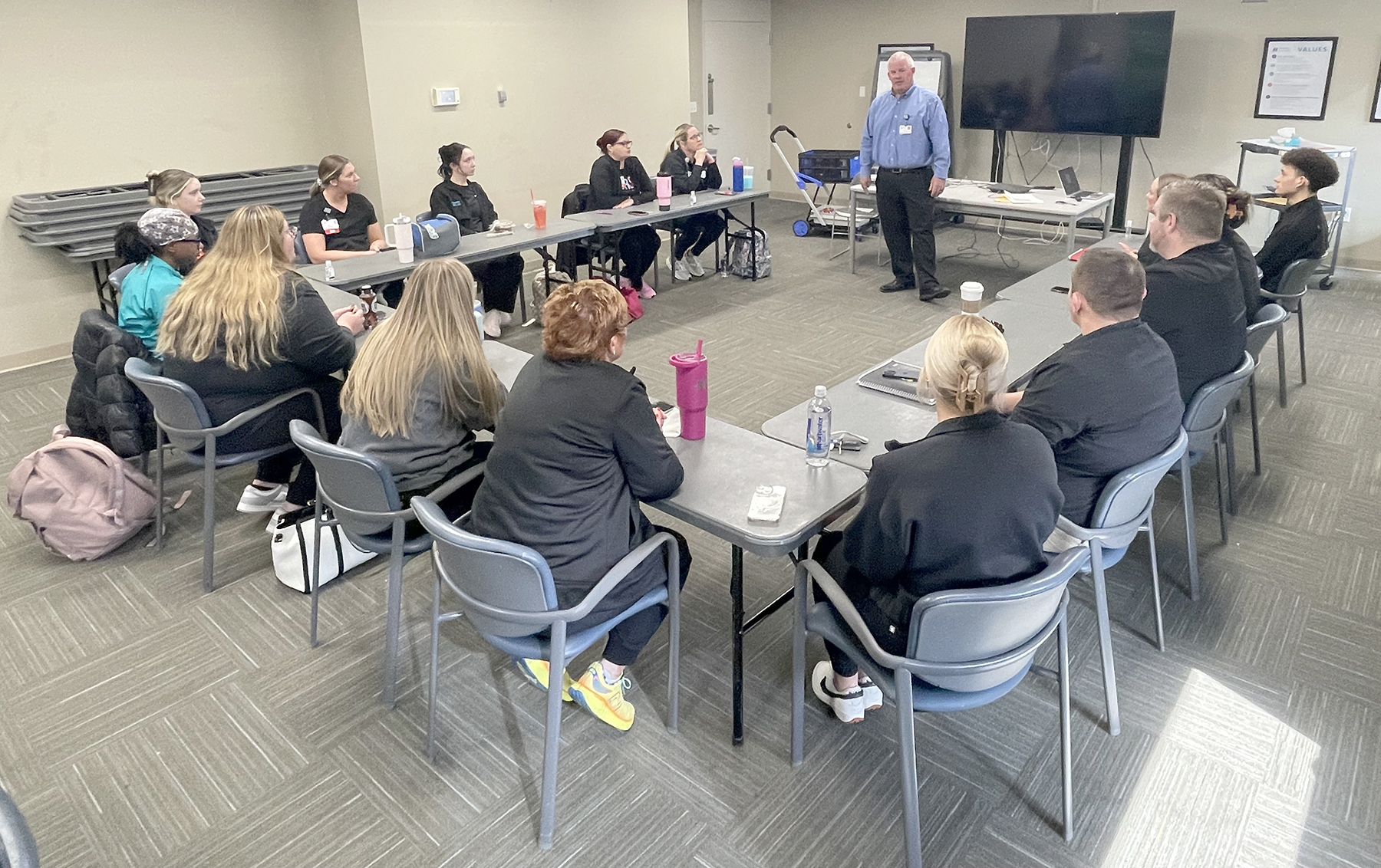 Blessing Hospital CNO, Tim Tranor speaking to classroom of nursing residents