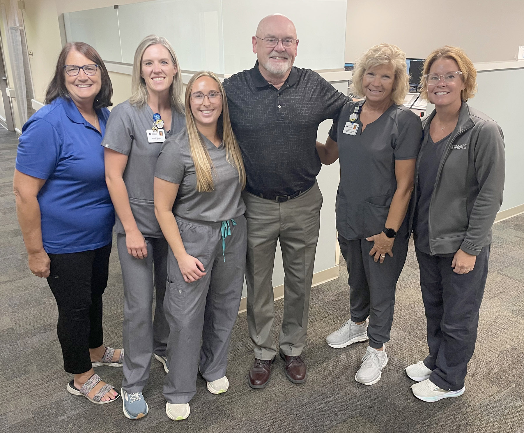 Jim Adams with some of the staff that provided his care at the Blessing Cancer Center