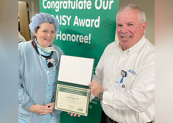 In the photo Jody accepts her DAISY Award from Tim Tranor, DNP, MBA, RN, Executive Vice President/Chief Operating Officer/Chief Nursing Officer, Blessing Health System.