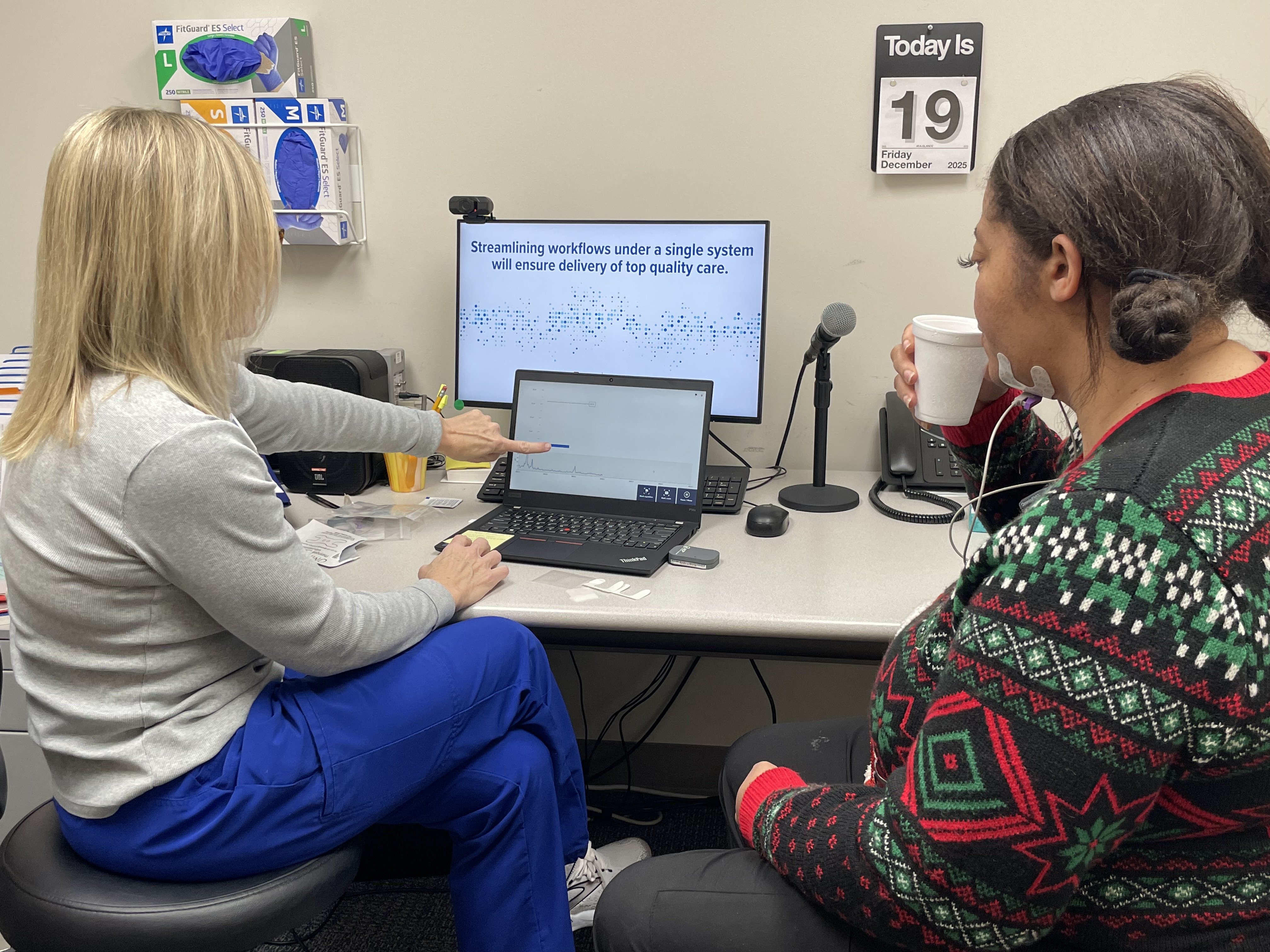 Speech Therapist Becky Spotts demonstrates the new technology being used with a patient in Blessing's Rehab facility