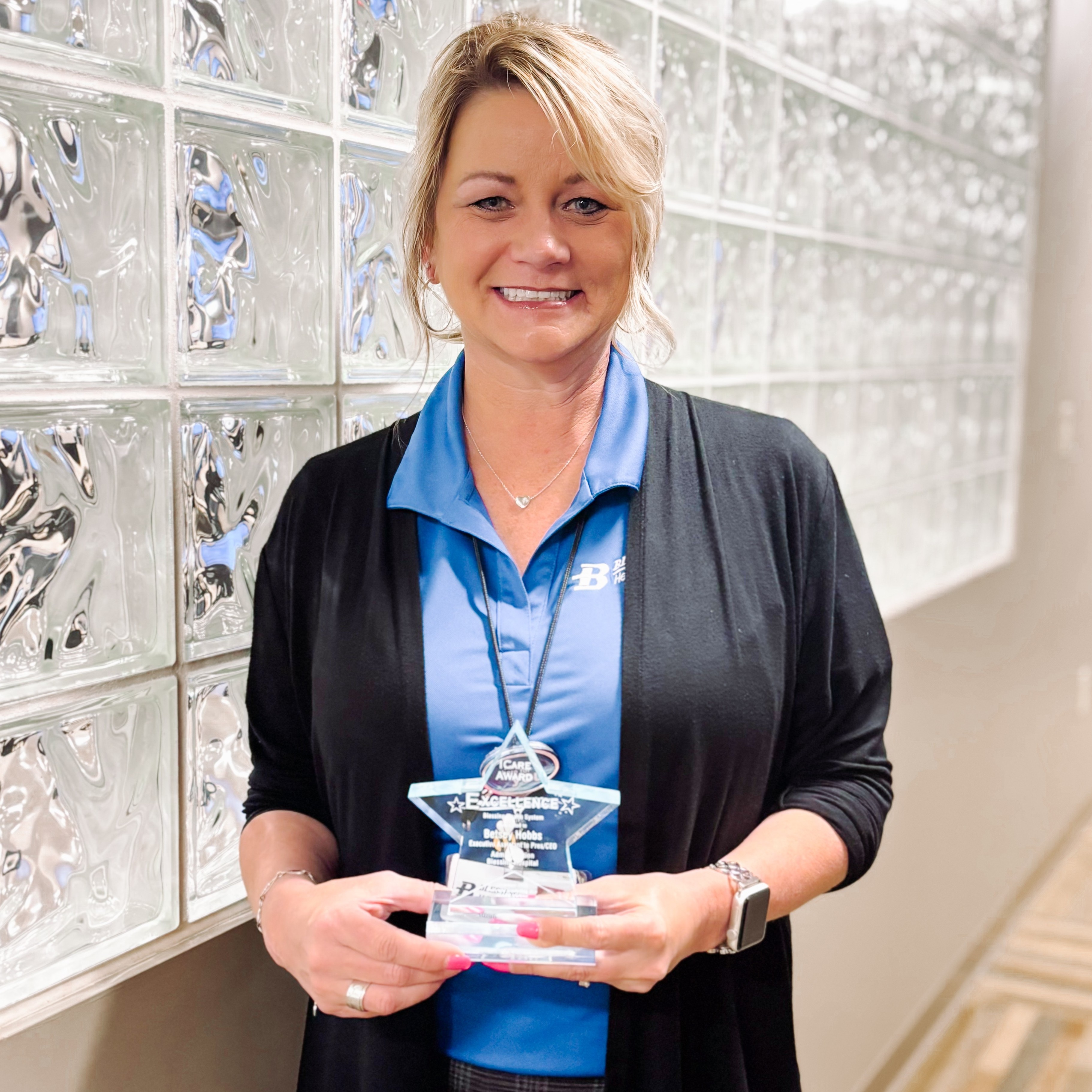 Betsey Hobbs receives Blessing Health System’s ICARE Award for Excellence.