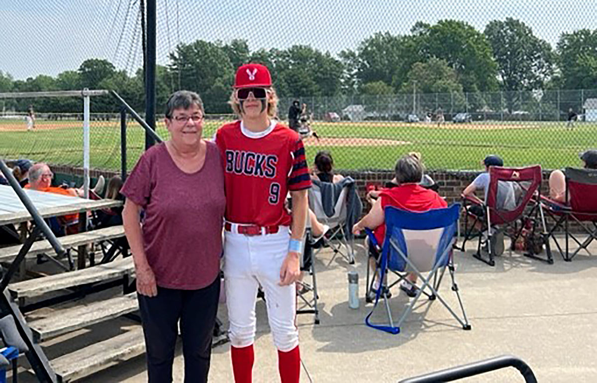 "Nancy at grandson baseball game"