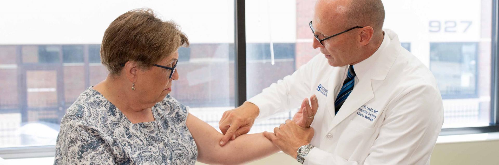 Dr. Leutz with shoulder patient