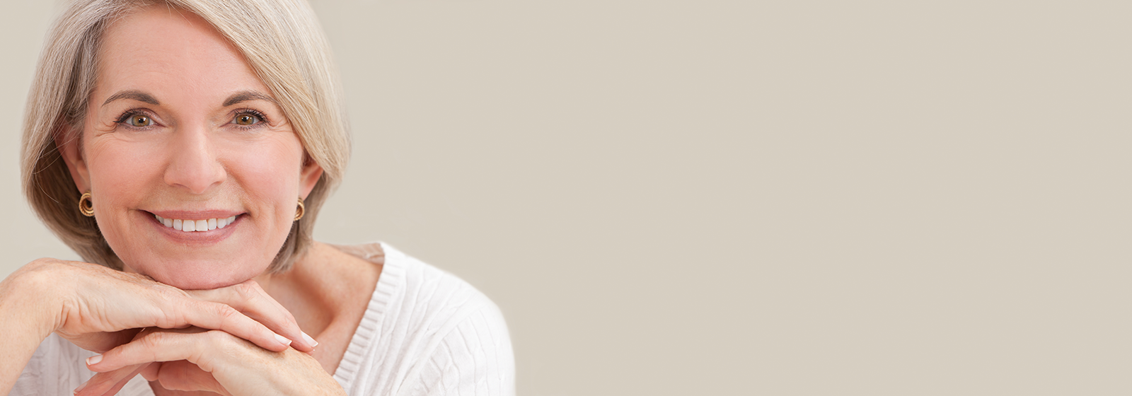 Woman Smiling with brown background