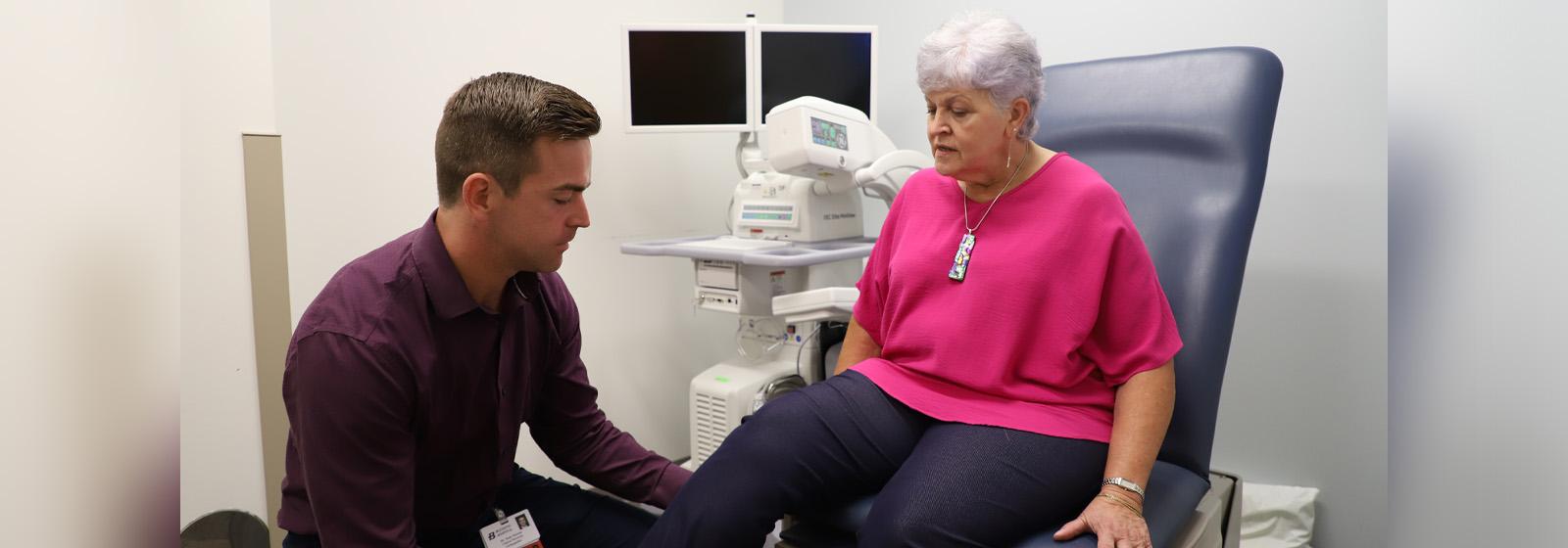 Sean Moroze MD Working with Patient
