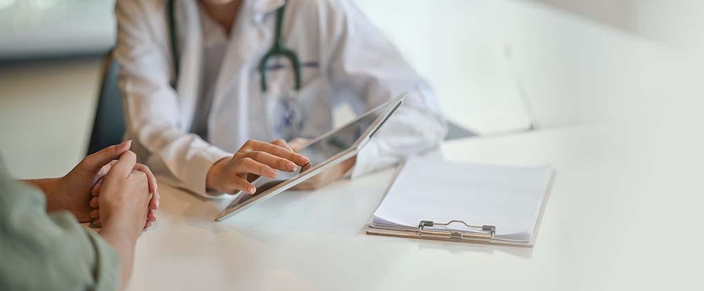 doctor speaking with a patient